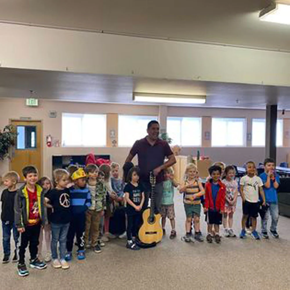 Kids With Guy With Guitar